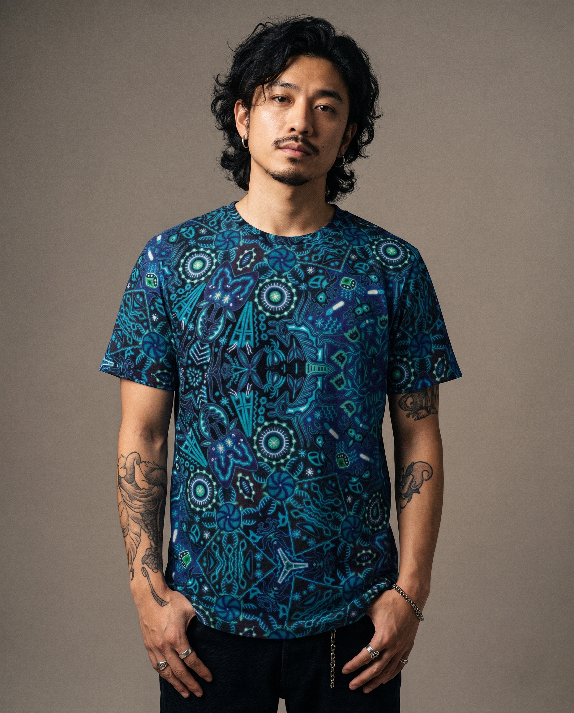 Alex wearing the Yarn Vision Pattern men's T-shirt in the All Is Mind studio